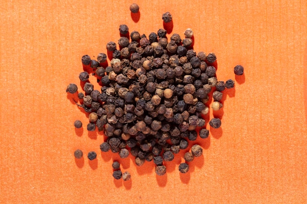 Black peppercorns top view