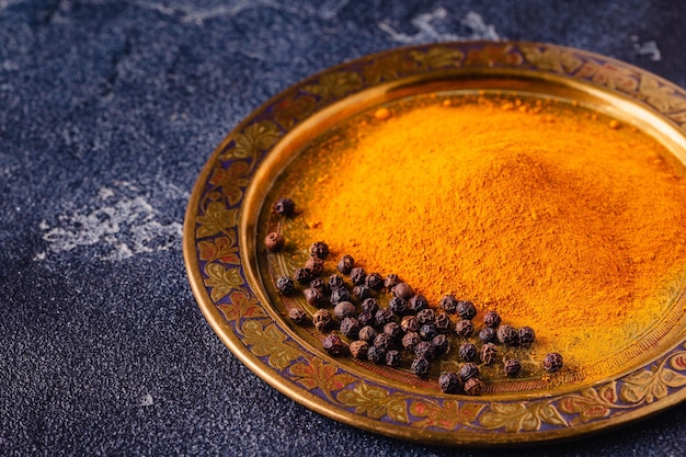 Black peppers and turmeric powder