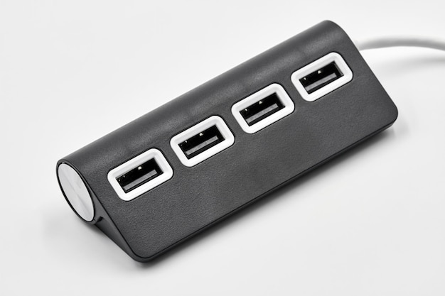 Black portable USB hub for four connections