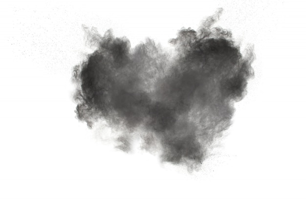 Photo black powder explosion on white background. black dust particles splash.