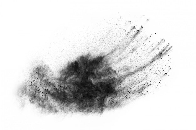 Black powder splatted on white background. 