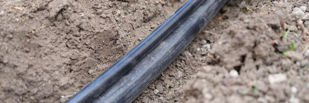 Black pvc sewer pipe optical fiber communication and communication infrastructure concept of