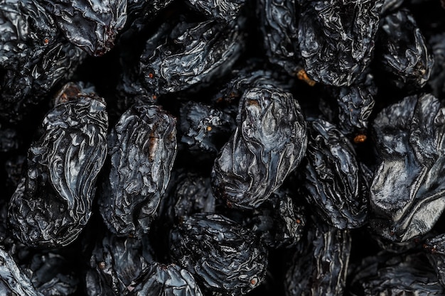 Black Raisin texture, popular dried fruit. Dried grapes.