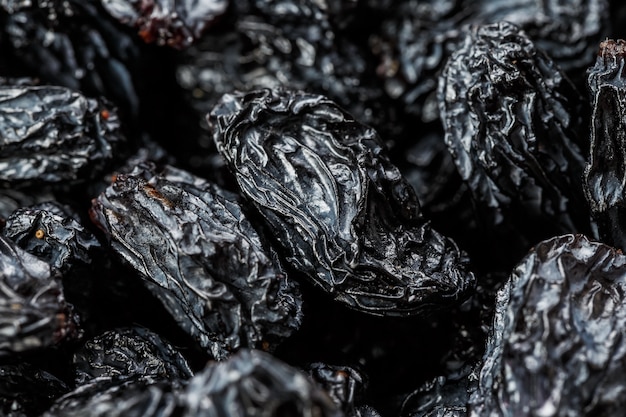 Black Raisin texture, popular dried fruit. Dried grapes.