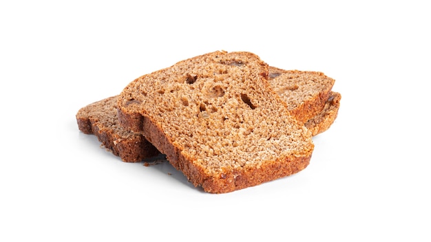 Black, rye bread with dried fruit on a white background. High quality photo