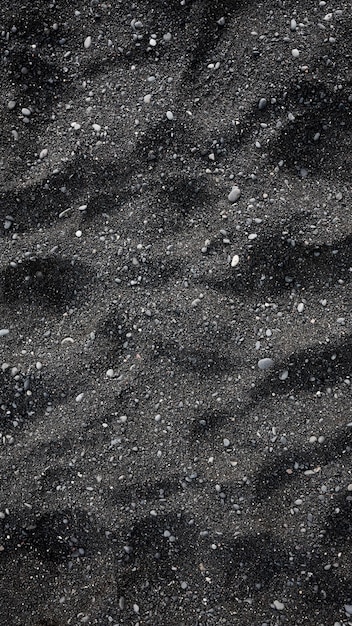 Black sand as a background in the Iceland sea shore Abstract composition Image for design and wallpaper on phone