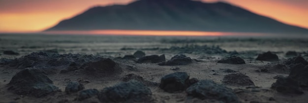 Black sand in the light of the sunset Beach with black sand on the background of the mountain at sun