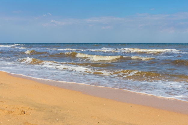 The Black Sea in sunny weather Surf on the beach wavessandy shore