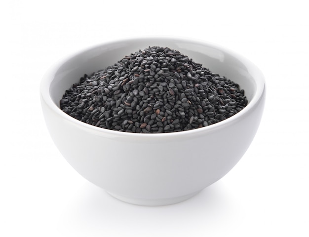 Black sesame in a bowl on white space