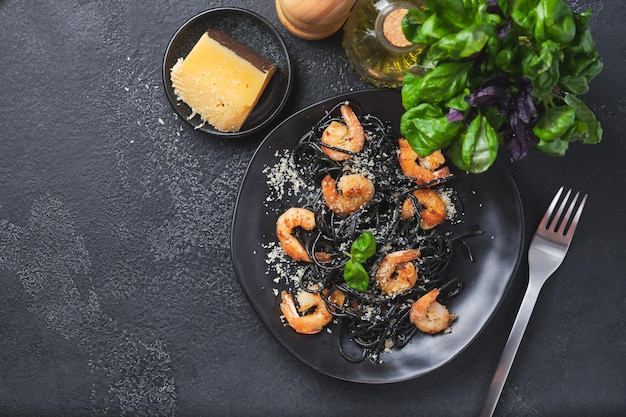 Black shrimp pasta with olive oil and parmesan