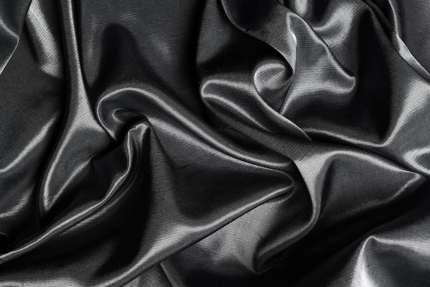 Black silk fabric surface background