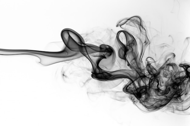 Black smoke on white background. abstract fire design