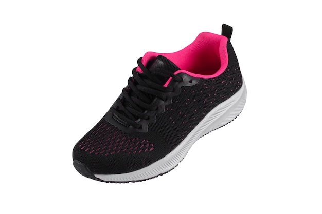 Black sneaker made of fabric with pink inserts with a white sole on a white background