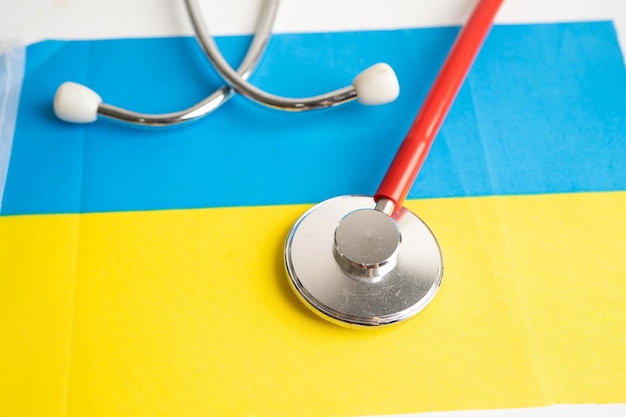 Black stethoscope on Ukraine flag background Business and finance concept