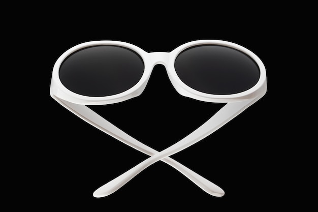 black sunglasses with metal frames isolate on a white background