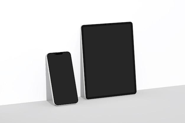 A black tablet and a black tablet are next to each other.