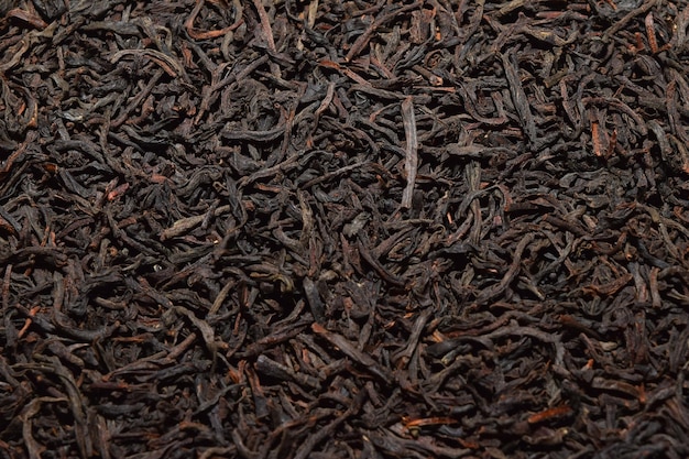 Black tea background dried black tea English Breakfast Tea ingredients Ceylon Black Tea close up top view