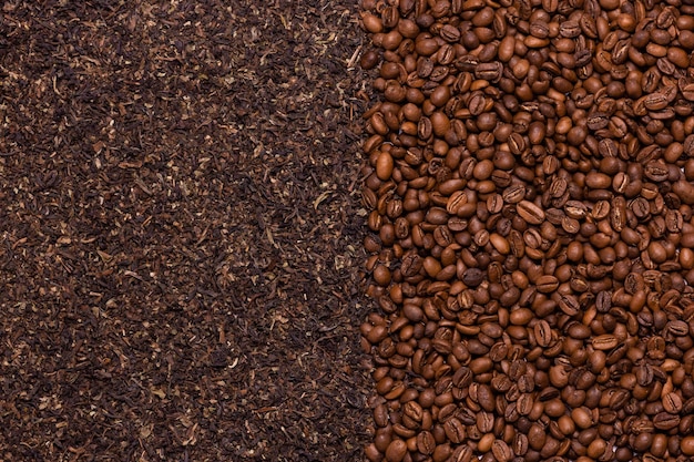 Black tea loose and coffee beans background