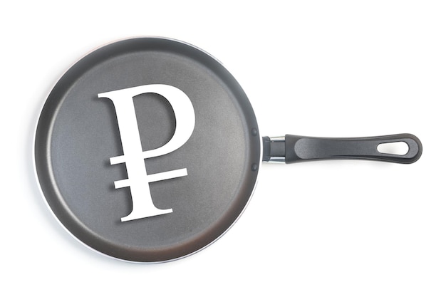 Black Teflon frying pan on a white background with a white symbol Russian ruble