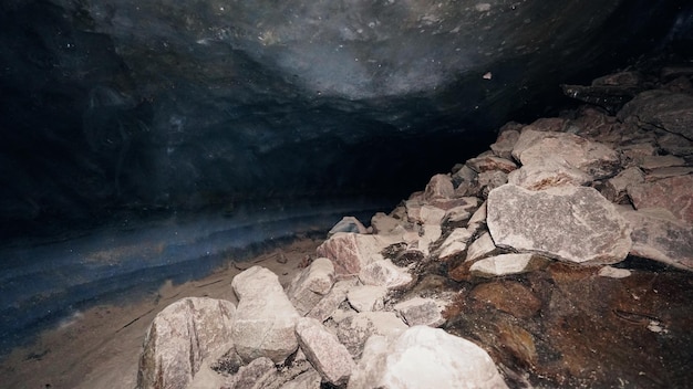 The black transparent color of ice in the cave