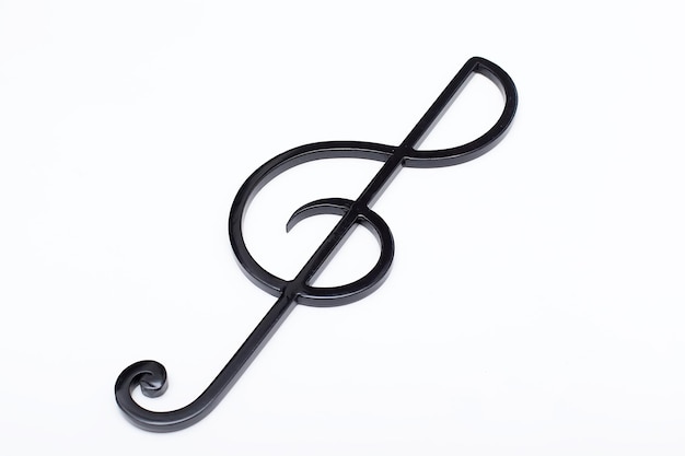 Black treble clef on a white background Music symbol