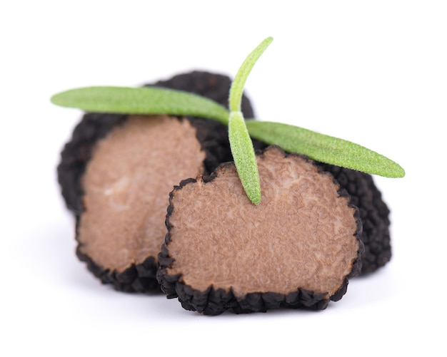 Black truffles isolated on a white background Fresh sliced truffle Delicacy exclusive truffle mushroom Piquant and fragrant French delicacy Clipping path