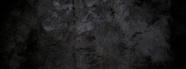 Black wall scary or dark gray rough grainy stone texture background Black concrete for background