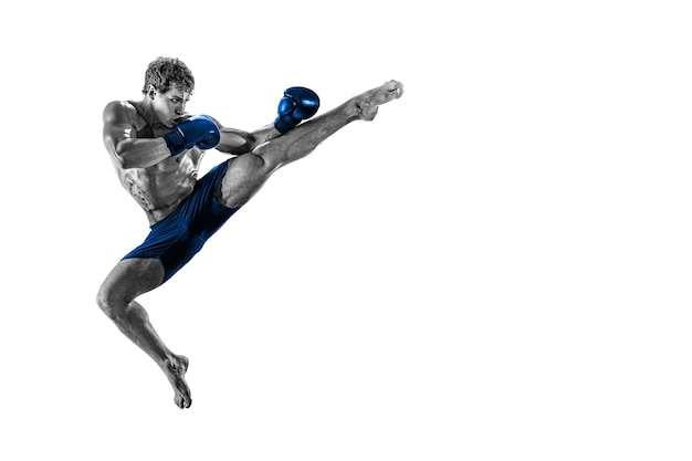 Black and white athlete boxer in jump in blue gloves isolated on white background sport concept