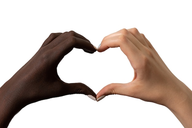 Black and white hands in the form of heart isolated on white