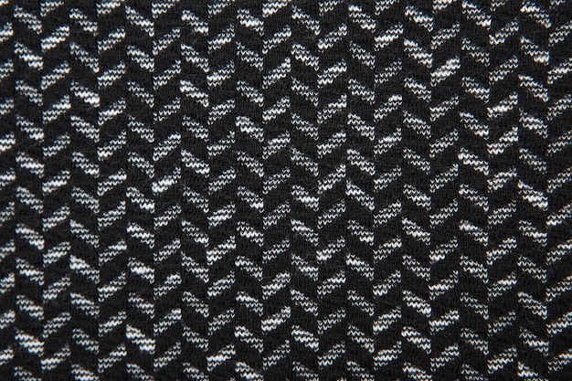 Black and white herringbone fabric pattern texture closeup