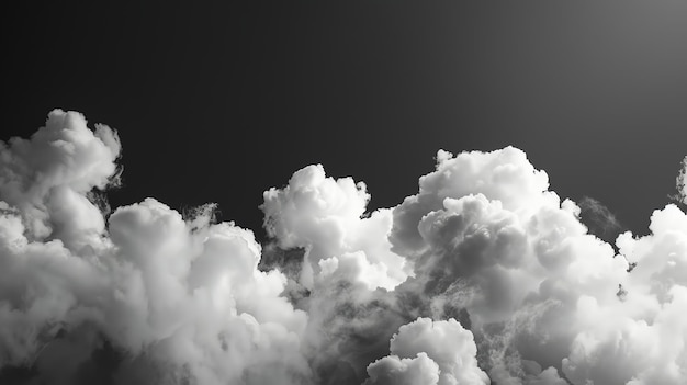 Black and white image of fluffy clouds against a dark sky