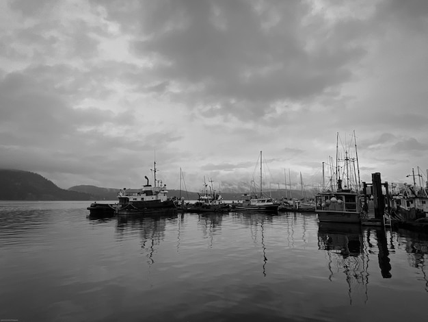 Black and white photo of a fishing marina in Vancouver Island Canada