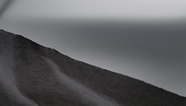 a black and white photo of a hill with a person on it