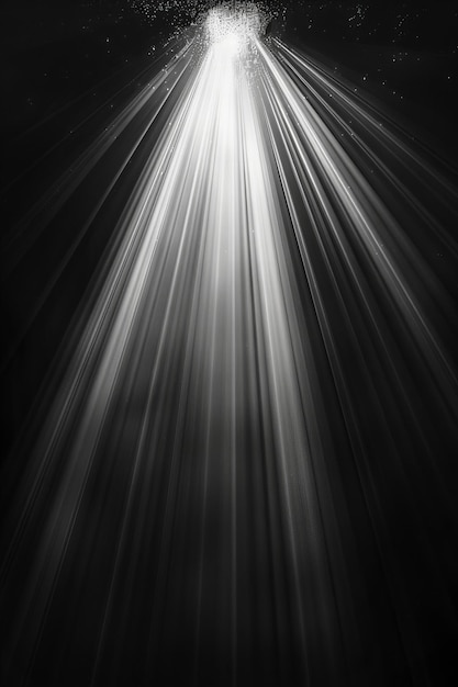 Photo a black and white photo of a light shining down on a black background