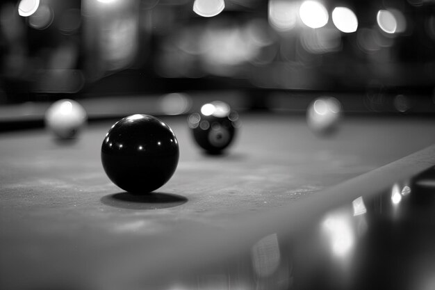 A black and white photo of a pool table