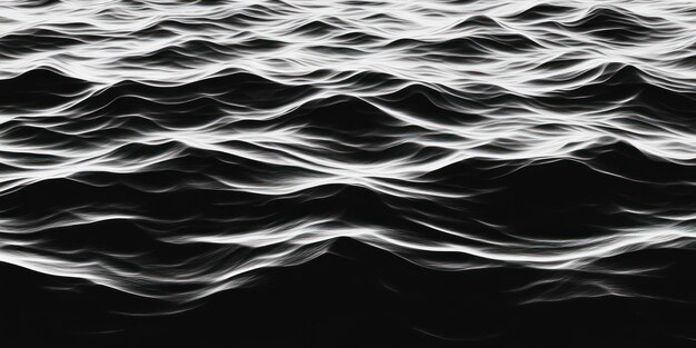 a black and white photo of a wave with the reflection of light on it