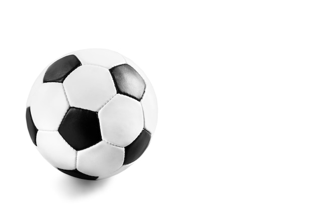 Black and white soccer ball on the white background