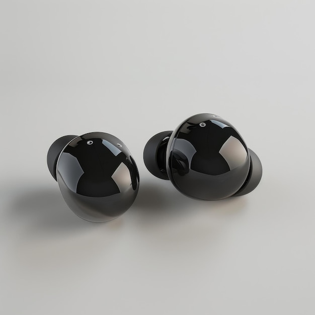 Black wireless earbuds on light gray background designed for audio technology enthusiasts