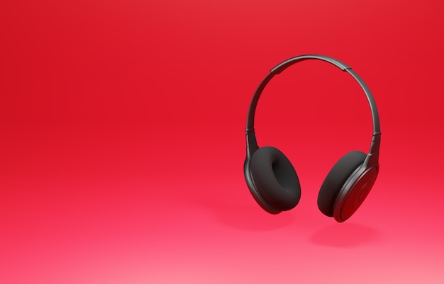 Black wireless headphones isolated on a red background