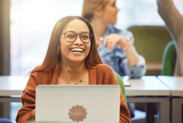 Black woman laptop and student smile in classroom for university education learning and school environment happiness African girl happy laughing and studying with digital tech device for college