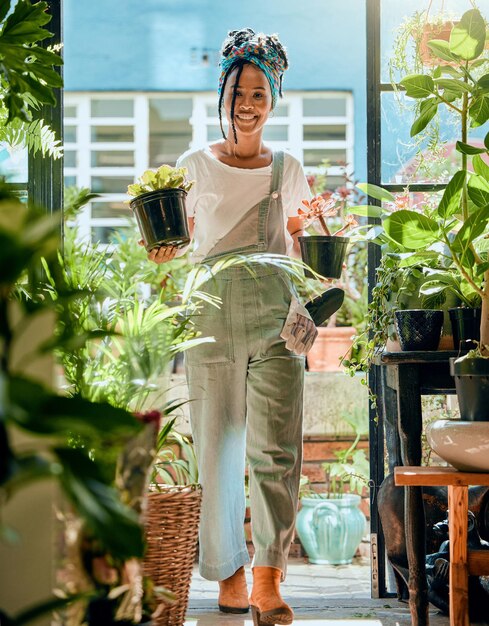 Black woman portrait and plant shop for gardening nursery or greenhouse retail Entrepreneur working in green startup or small business for sustainability environment and entrepreneur growth