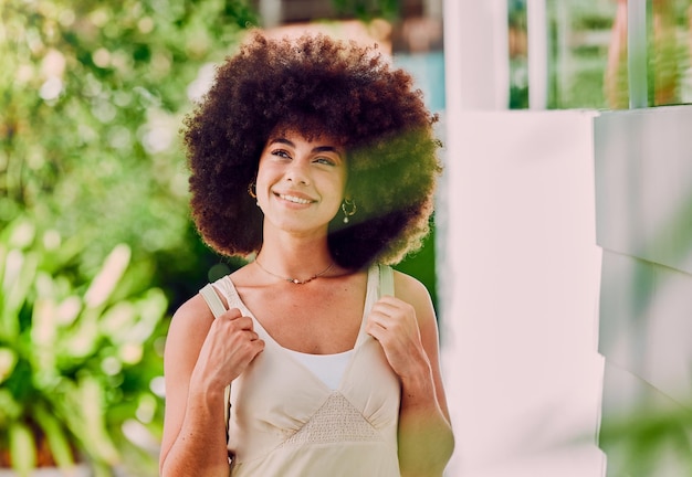 Black woman travel and happy while walking in a city smile and relax having fun and thinking outdoors Student girl and backpack for traveling in Mexico explore sightseeing and solo adventure