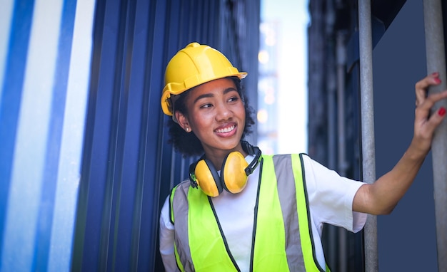 Black women American women afro of color Work in an international shipping yard area Export and import delivery service with containers