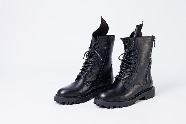 Black womens leather laceup boots from the new collection on a white background from leather autumnwinter 2022 Boots closeup