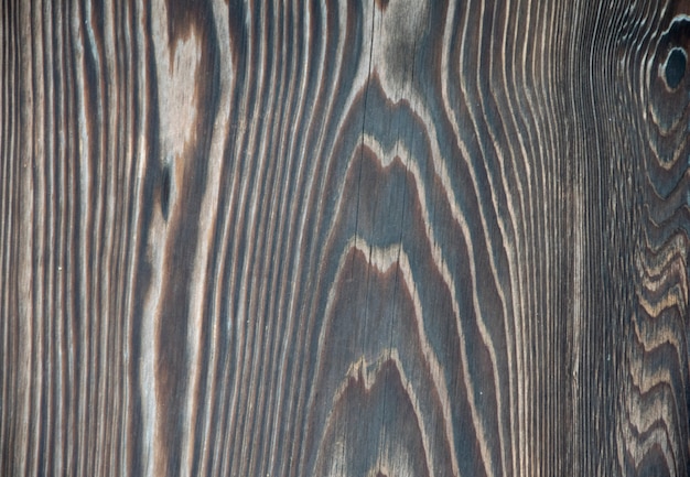 Black wood texture background.