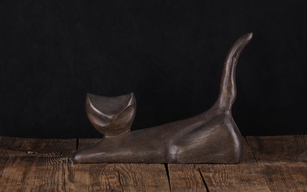 black wooden decorative cat