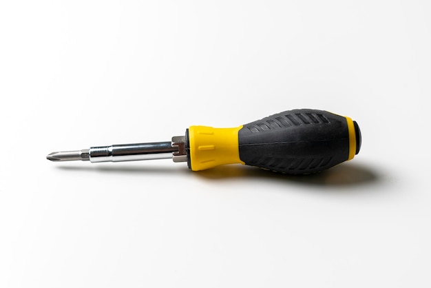 A black and yellow screwdriver isolated repair tool equipment