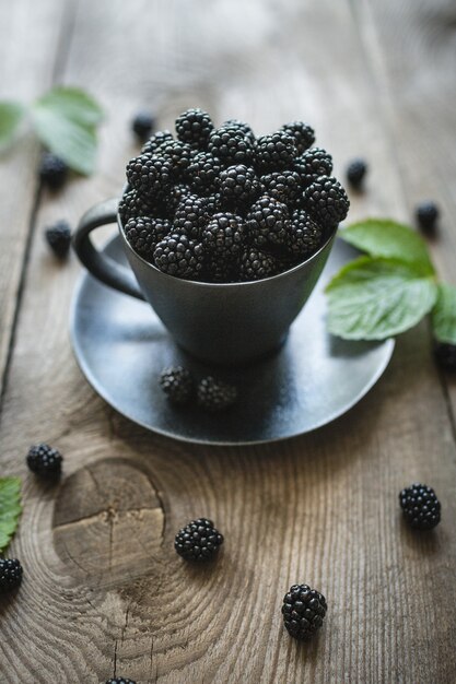 Blackberries, fresh berries, wooden background, vegetarian food