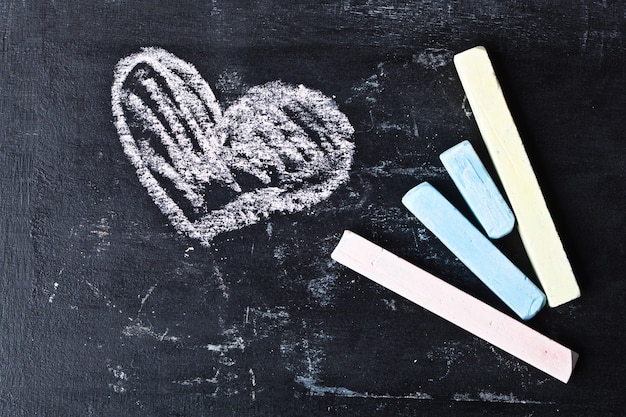 Blackboard, chalk and heart