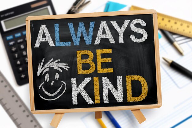 Photo a blackboard with the text always be kind